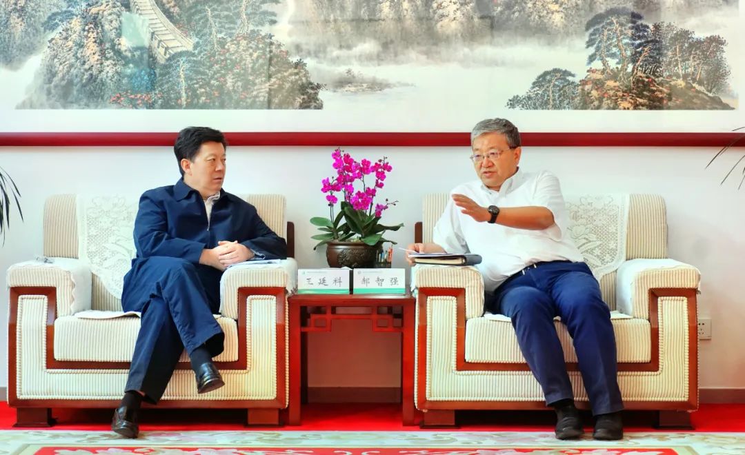 郝智强与中国人民保险集团总裁王廷科一行交流座谈